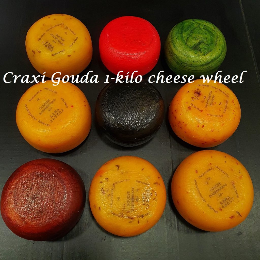 Artisanal gouda 1-kilo herb cheeses, small raw milk gouda wheel with spices, and aromatic herbs. Cheese wheel weight of ±1000gr.