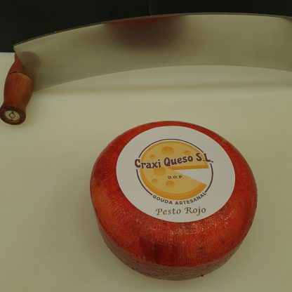 Dutch artisan mini gouda red pesto cheese, artisanal raw milk Gouda cheese with red pesto spices & herbs (chillies, pepper, basil, garlic, oregano leaf, and paprika) with a cheese wheel weight of ±500gr.
