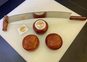 Artisanal raw milk mini Gouda Iberian herbs cheese with pieces of dried tomato & Iberian herbs, small Gouda cheese wheel with a weight of ±500gr.