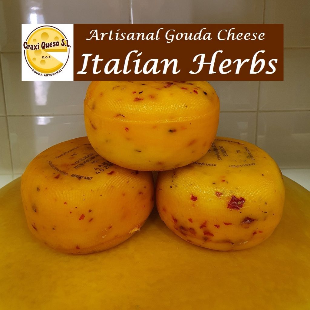 Small cheeses with Italian herbs, artisan 500 g Gouda cheese wheels with dried tomato pieces, onion, paprika, garlic, basil, thyme, and pepper