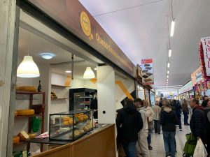 Craxi Cheese shop in Huelin Market in Málaga city, Spain. Raw milk artisan Gouda cheese