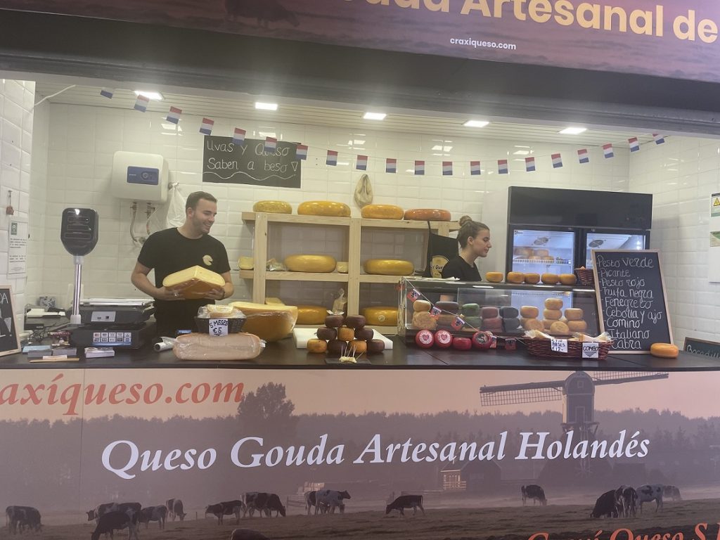 Craxi cheese shop in the Mercado de la Merced in Málaga, Spain. Craxi Gouda farmer's cheese is a Guaranteed Dutch Traditional Specialty