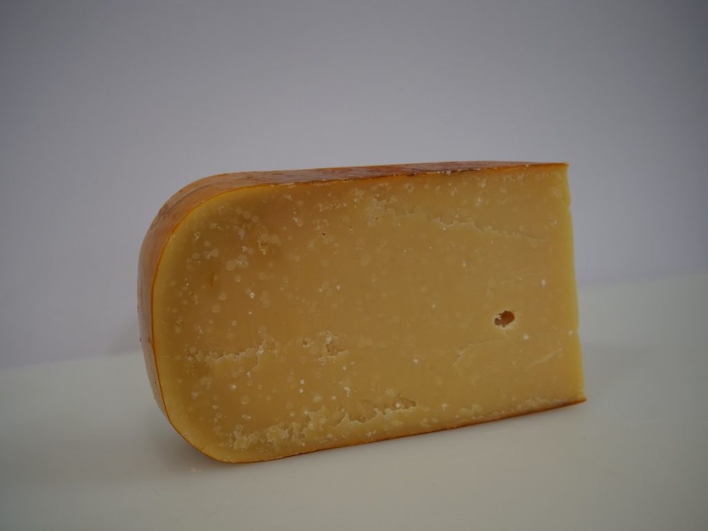 Dutch cheese, kilo of 1-year-old Gouda cheese, traditional Gouda made on the cheese farm of raw cow's milk