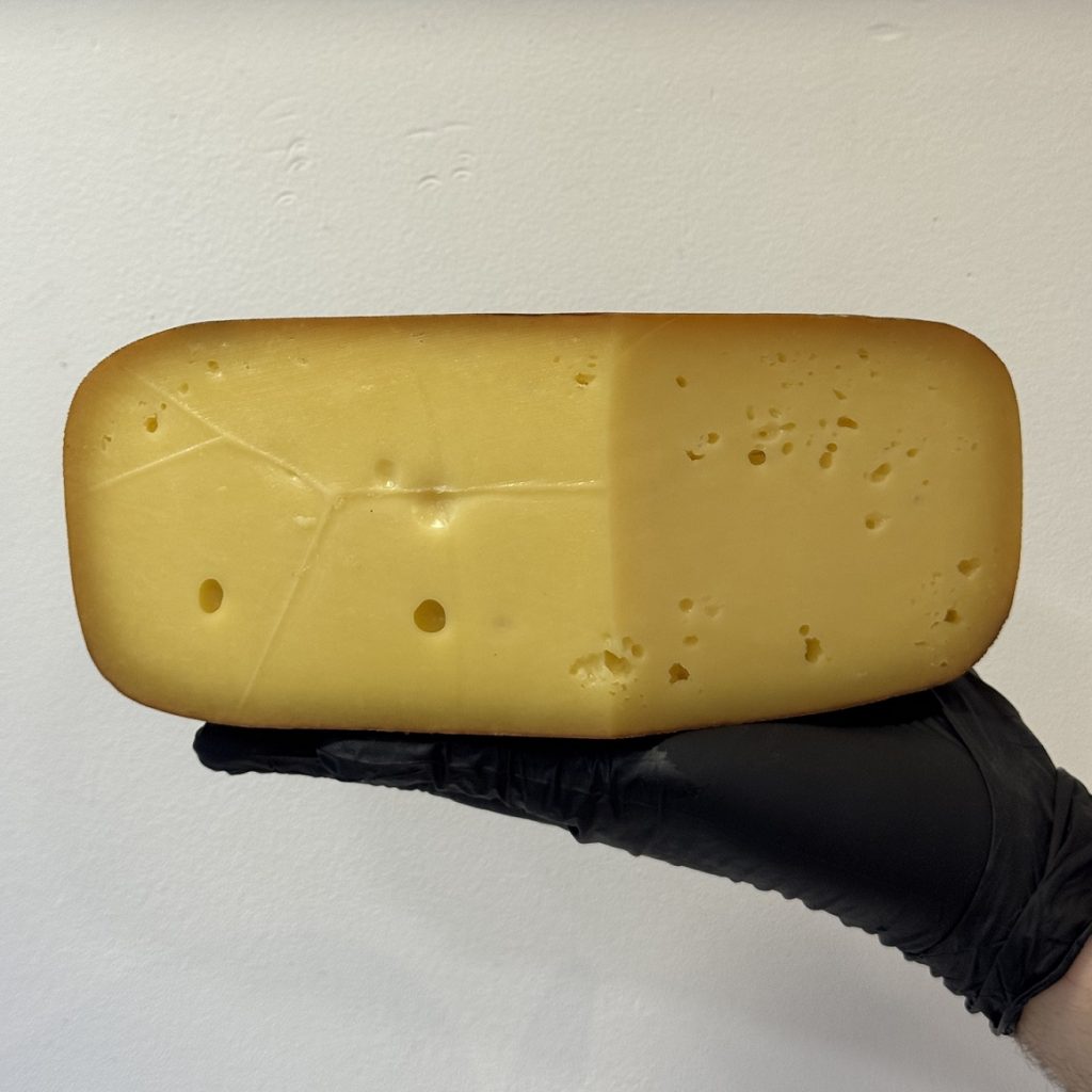 Gouda smoked. Artisanal cow's milk cheese made from raw milk and traditionally smoked in a smokehouse.